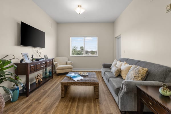 Bright common area with comfortable seating and decor