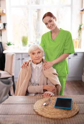 A caregiver with a resident in a cozy interior