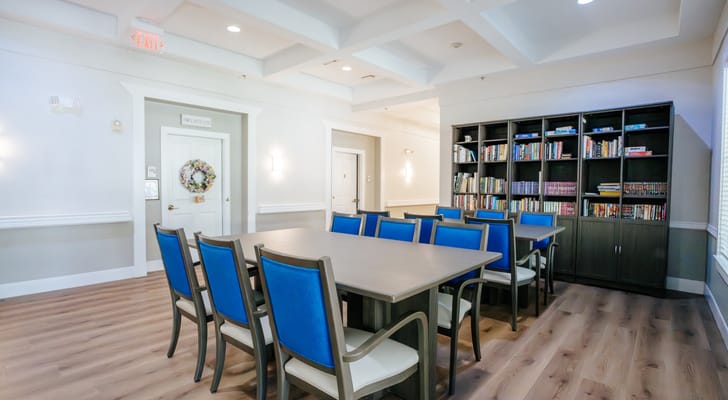 Bright common area with tables and chairs