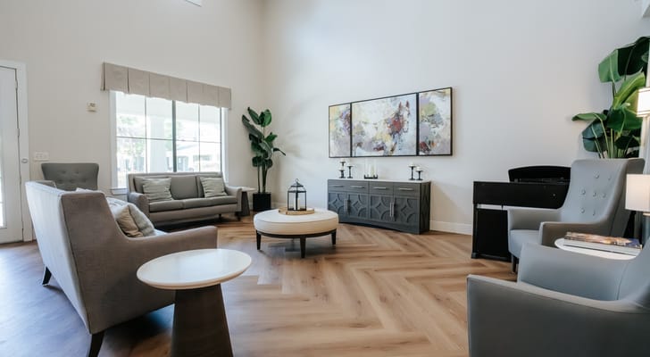 Bright common area with seating and art