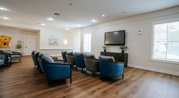Common area with seating and a television