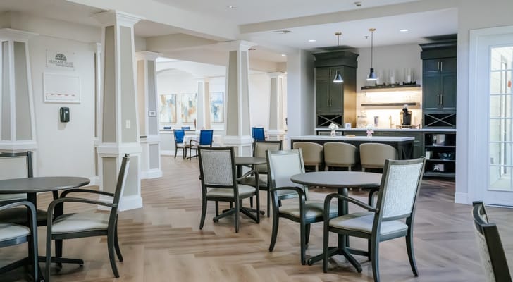 Bright common area with seating and a coffee station