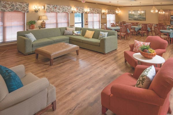 Bright common area with comfortable seating and decor