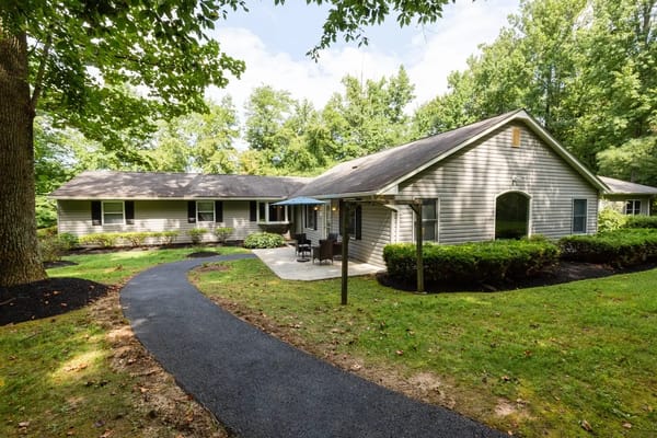 Exterior view of the facility with green landscaping