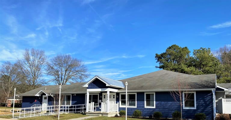 Exterior view of a single-story senior living facility