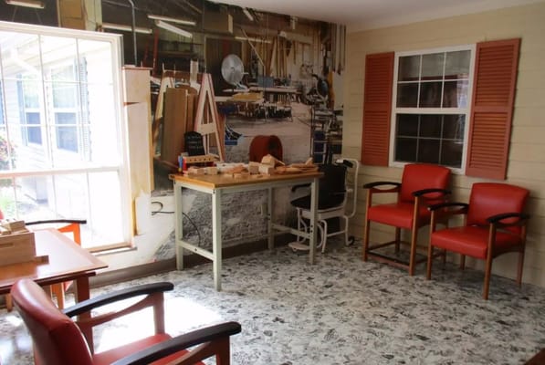 Interior space with a worktable and seating area