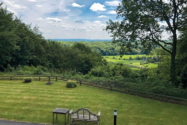 Scenic view of green landscape from the facility garden
