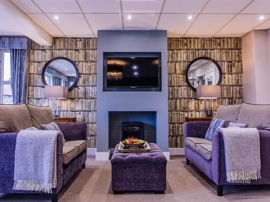 Cozy lounge area with comfortable seating and decor