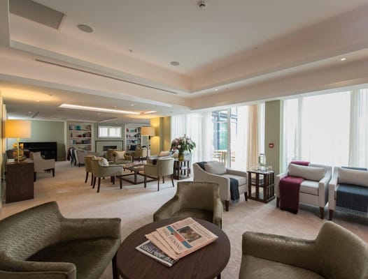 Bright common area with seating and natural light