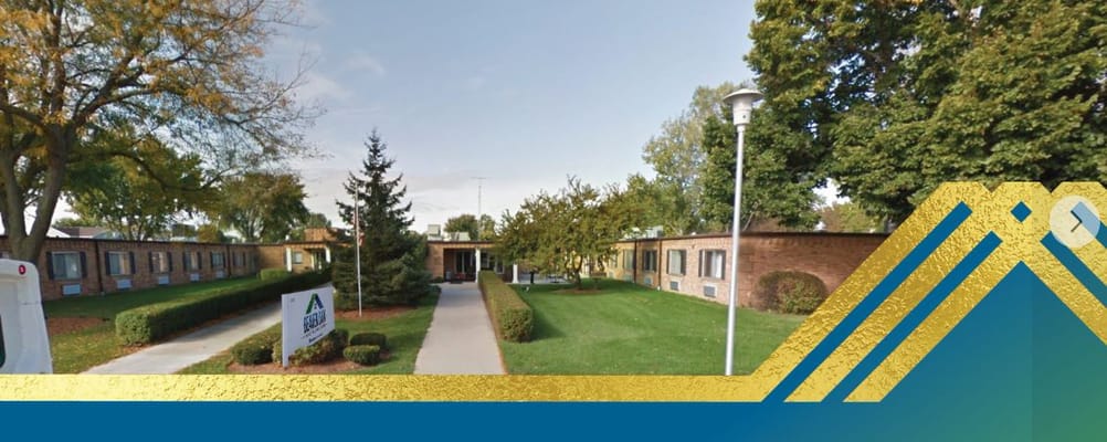 Exterior view of Beaver Dam Health Care Center with landscaping