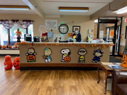 Decorated reception area with festive Halloween theme