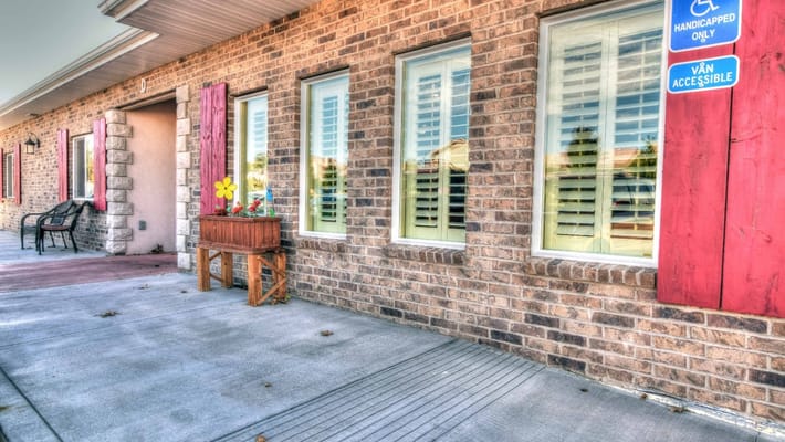 Exterior view of a building entrance with signage