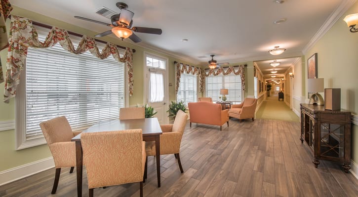 Bright common area with seating and windows