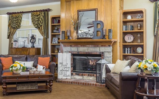Cozy common area with seating and fireplace