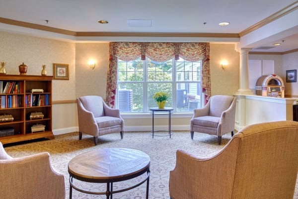 Cozy common area with comfortable seating and a window view