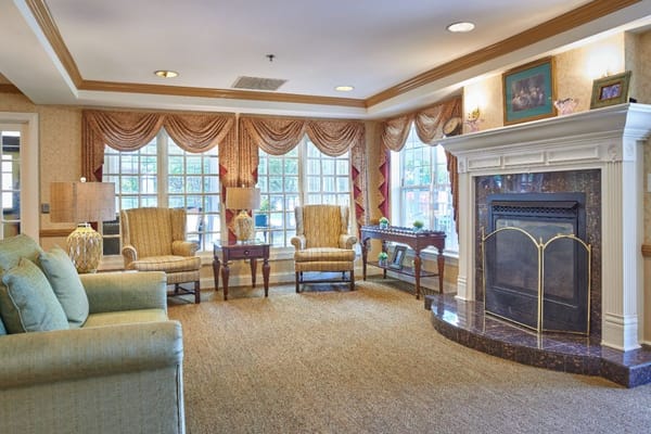 Cozy common area with comfortable seating and a fireplace