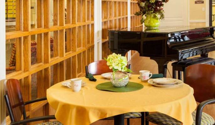 Dining room table set for a meal with elegant decor