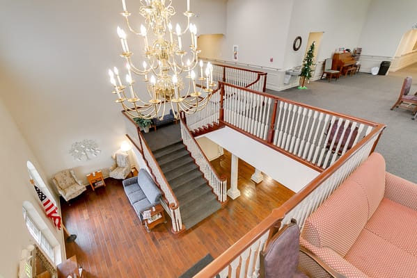 Interior view of a spacious lobby with a staircase