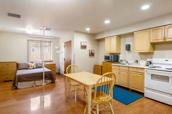 Cozy interior of a resident room with kitchen area