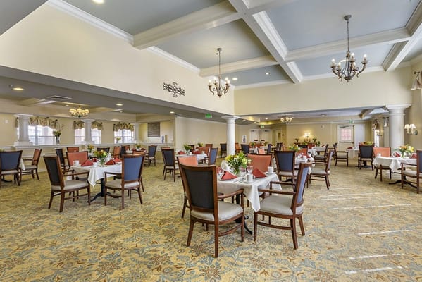 Dining area with tables set for a meal