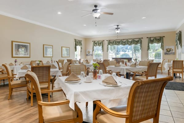 Bright dining room with neatly set tables