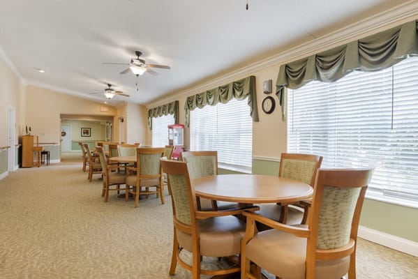 Interior view of a common area with tables and chairs
