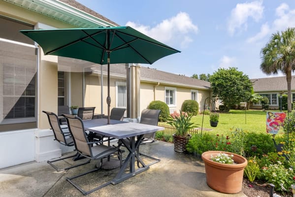 Outdoor patio with seating and garden