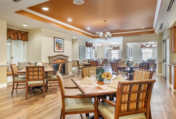 Dining room with tables set for residents