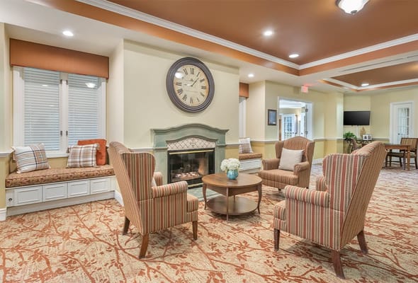 Cozy common area with seating and fireplace