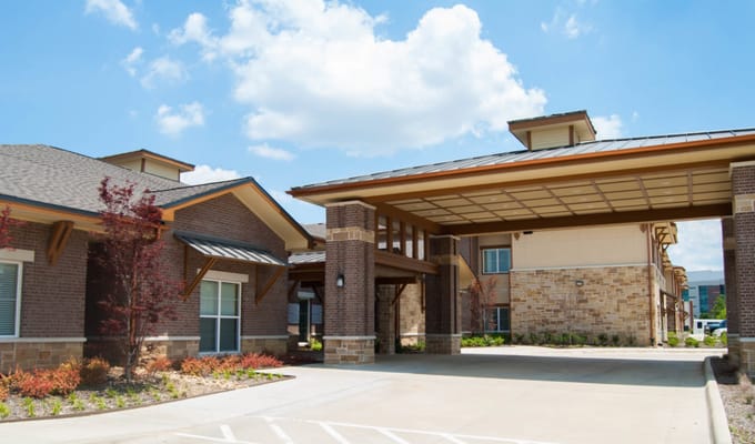 Front entrance of Cedar Bluff Assisted Living facility in Mansfield, TX