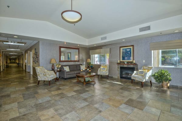 Bright common area with seating and decor