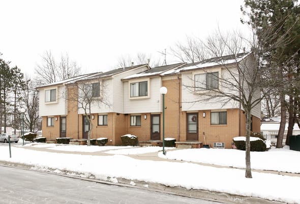 Exterior view of Cherry Hill Place Apartments in winter