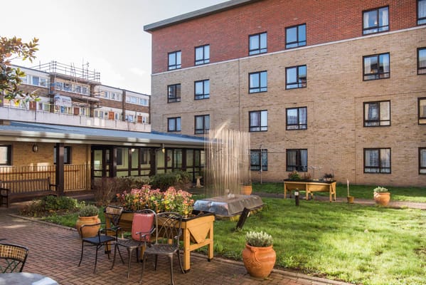 Outdoor space with seating and garden area