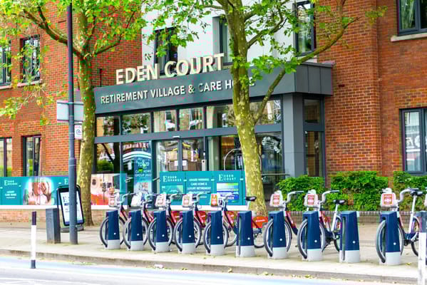 Exterior view of Eden Court Retirement Village with bike racks