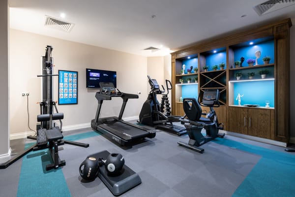 Modern fitness area with gym equipment