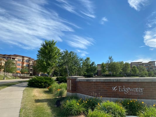 Outdoor view of Edgewater facility with gardens