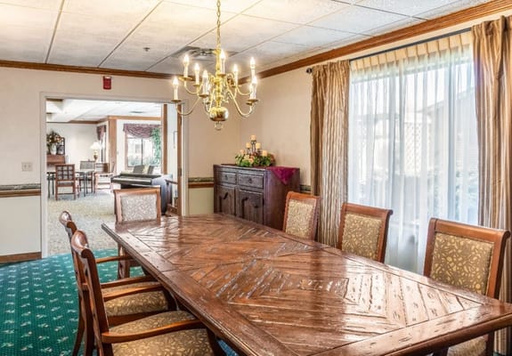 Bright dining room with a large wooden table