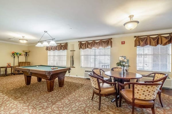 Comfortable common area with a pool table and seating
