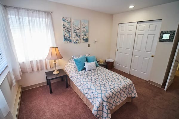 Cozy private room with a bed and decor