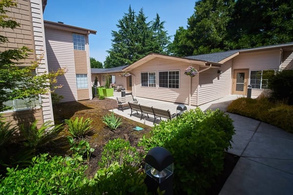 Garden area with benches and landscaped walkways