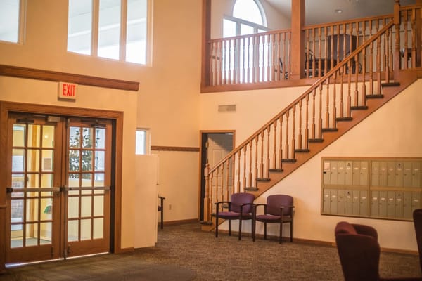 Interior view of a lobby area with stairs
