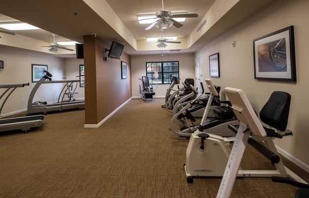 Interior view of a fitness area with exercise equipment