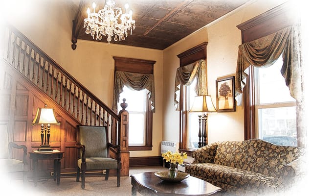 Elegant living room with chandelier and comfortable seating