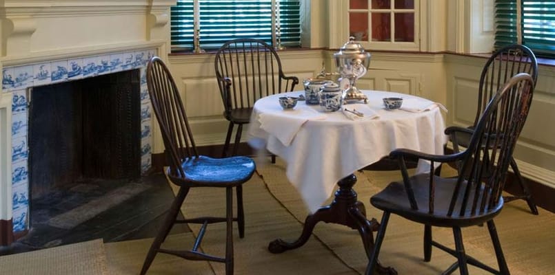 Dining table set with tea service in a cozy room