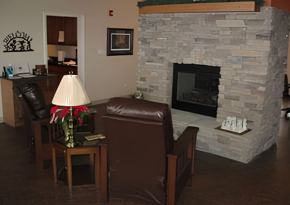 Cozy common area with seating and fireplace
