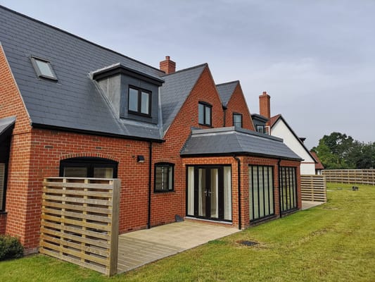Exterior view of a residential building with landscaping