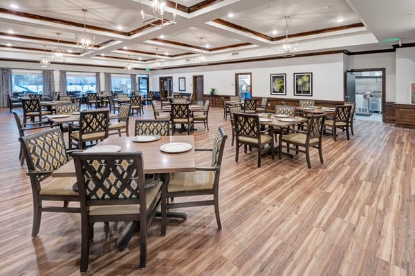Dining room with tables and chairs in a spacious setting