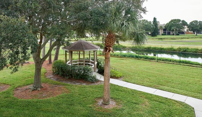 A gazebo in a landscaped outdoor space