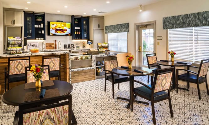 Dining area with tables and colorful decor