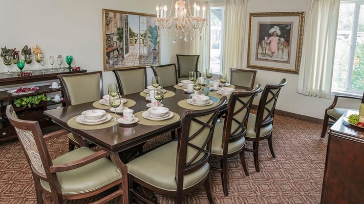Elegant dining room set up for a meal.